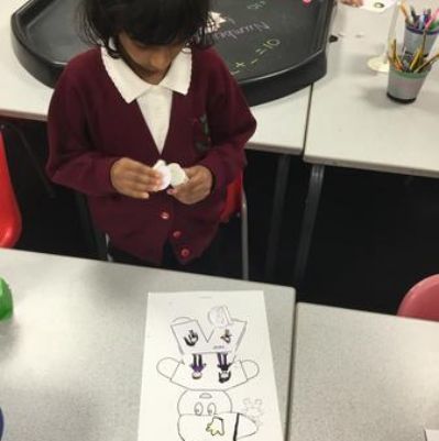 Year 1 Magpies Building a Gingerbread Man as part of our Jigsaw Lessons